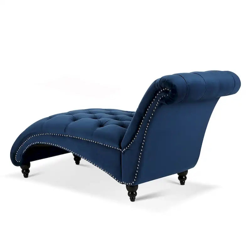 Chaise longue azul con capitoné de botones y ribete de tachuelas