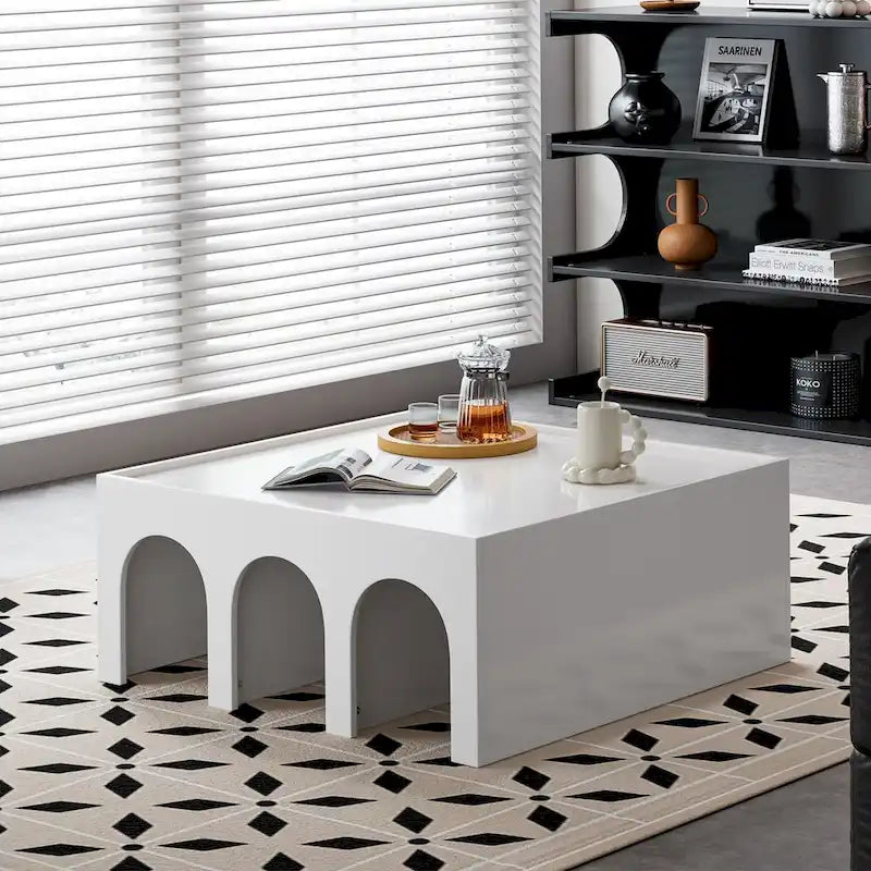 Estantería blanca de cuatro niveles y mesa de centro convertible