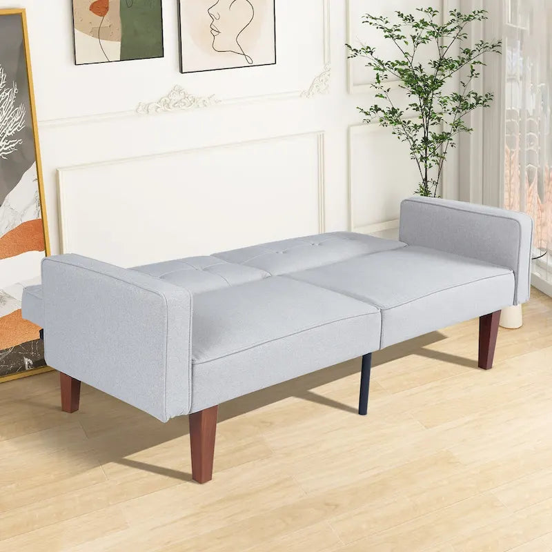 Sofá cama futón convertible con capitoné y respaldo dividido